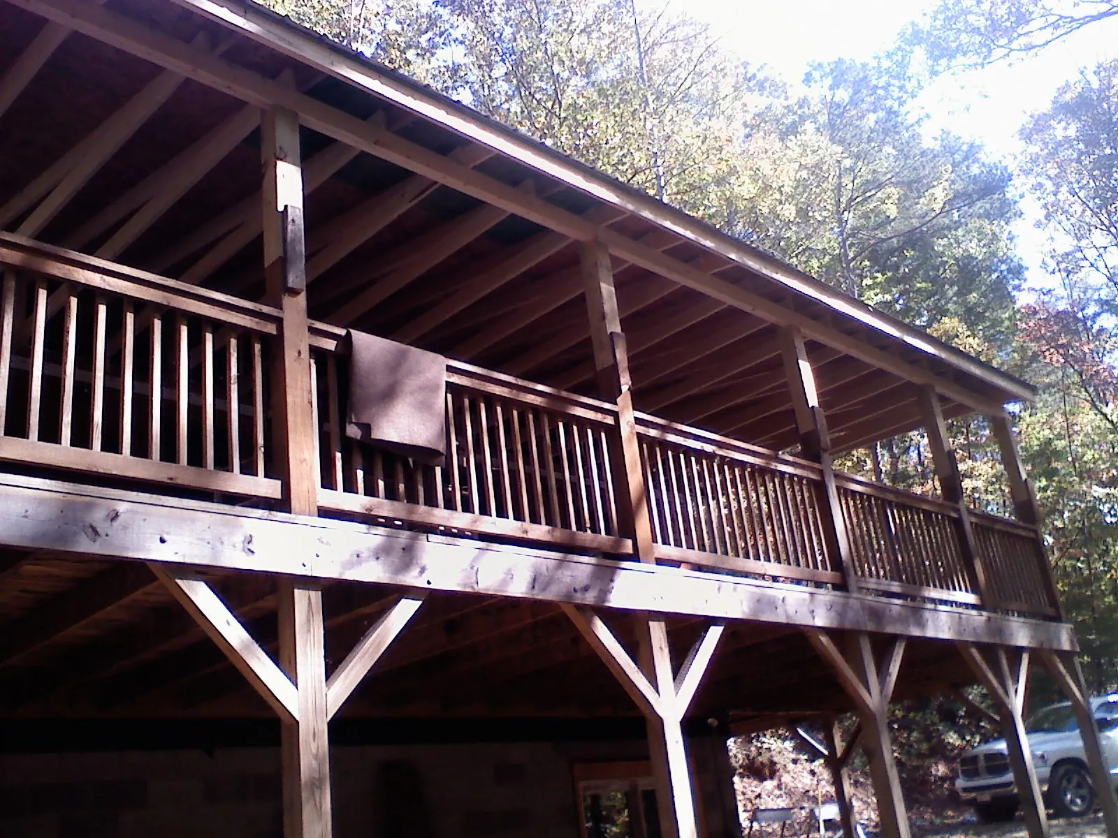 Timber framing under a new elevated porch and deck — Roof Leak Repair in Dyersville by Roofing Brothers
